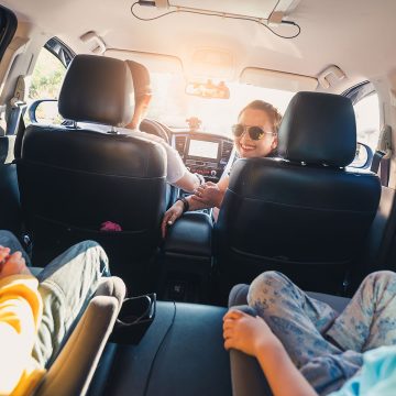 Auto loan after bankruptcy A family driving together, representing rebuilding with an auto loan after bankruptcy