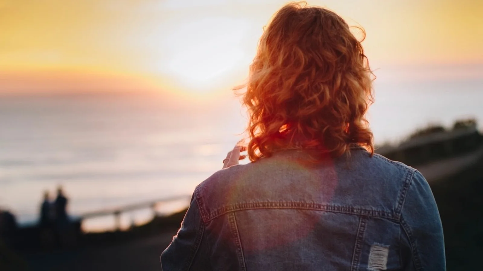 person long, curly hair denim
