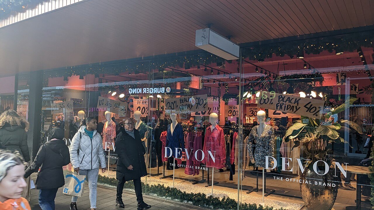 Black Friday promotions at a small local store at the Lijnbaan shopping district, that is located in the Rotterdammer neighbourhood of the Centrum, Ro